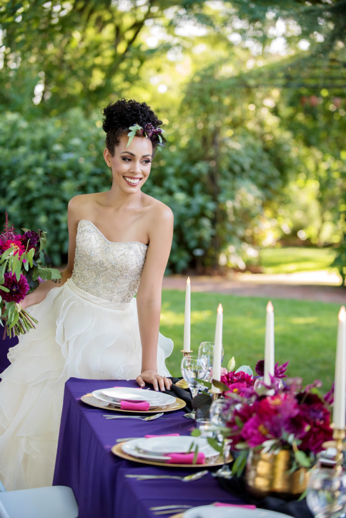 purple and magenta wedding decor by roses rentals