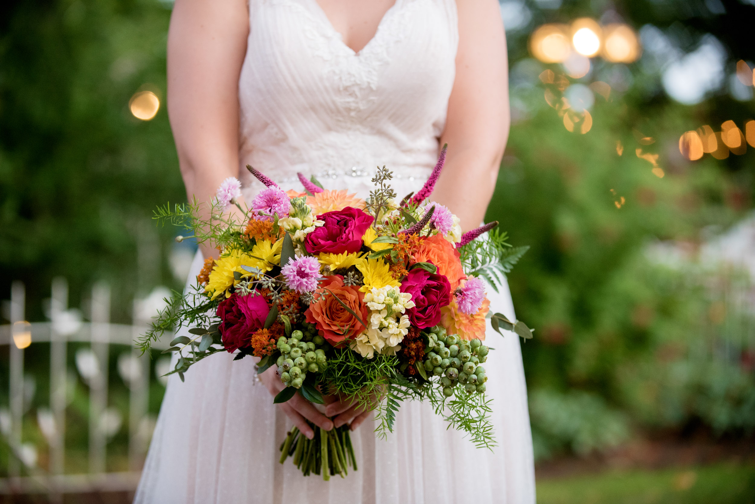 pink yellow and orange floral bridal bouquet